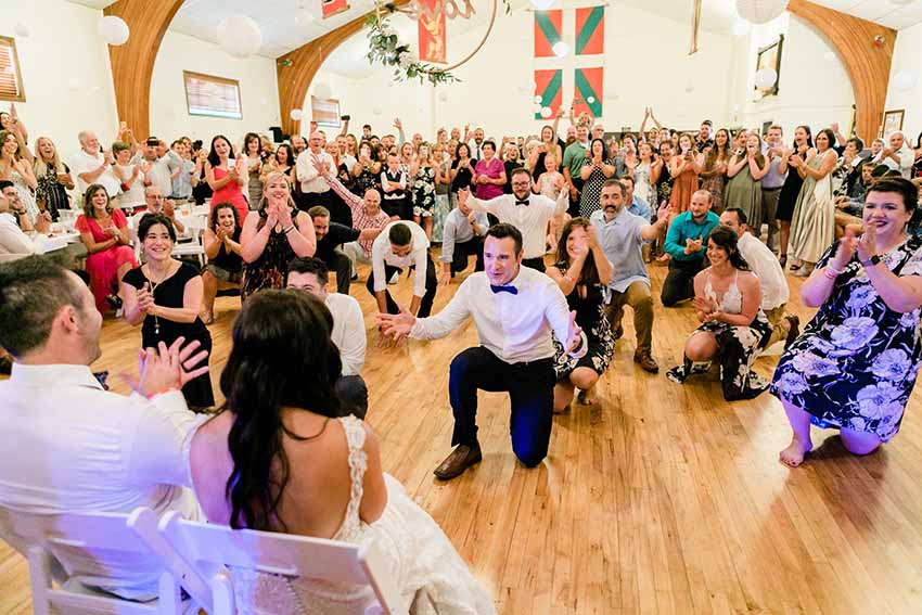 Friends and guests in general paying tribute to Jon and Krystle Aramburu on their wedding day celebrating a the Boise Basque Center