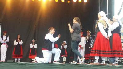 Cirbie Sangroniz proposing to her girlfriend, Amanda, during the Living Traditions Festival in Salt Lake City.  The joy is evident in the faces of the dantzaris and the emotional cry of her mother, Cristina (photo Marc Gaztambide-EuskalKultura.com)