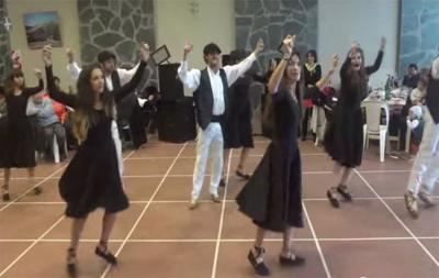 Members of the local Basque dance group Ugarritzak dancing at the festival in the Basque headquarters of Euskaldunak Denak Bat