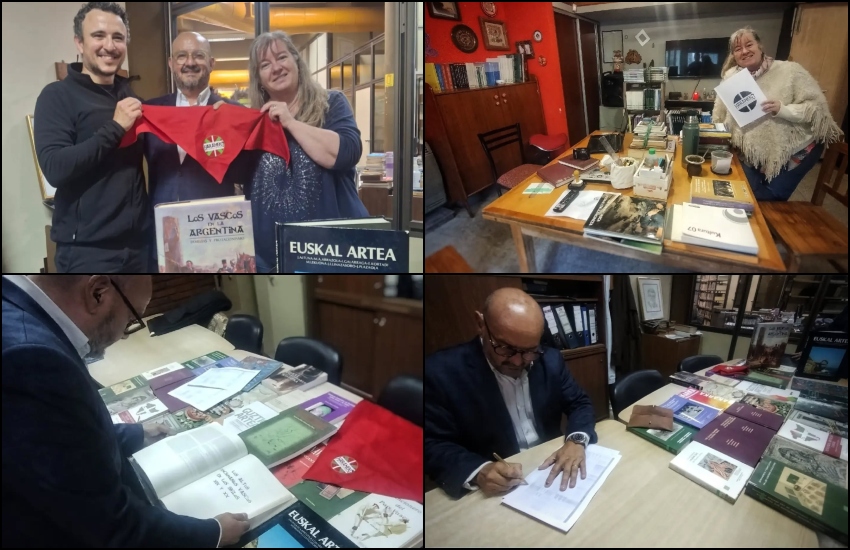 Iñaki Esquiroz, secretario de Haraneko E.E., Fernando Saldivia, presidente de la Biblioteca Popular Agustín Álvarez y la bibliotecaria Virginia Echeverría, en la Biblioteca Popular Agustín Álvarez de Trelew el día de la recepción del acervo bibliográfico 