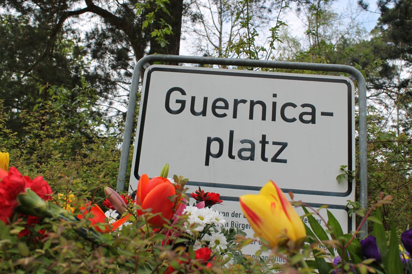 Flowers and poems in the Gernika Plaza in Berlin