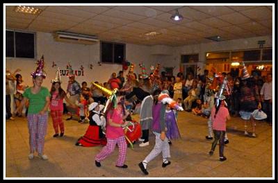 The end of year party for Lagun Onak with all of the dancers gathered to dance Carnaval de Lantz