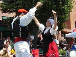 Maite Iribarren-Gorrindo and PJ Mansisidor perform a jota for the crowd on Boise's Basque Block