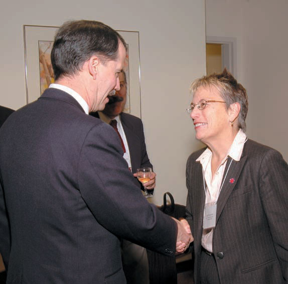 Jeri Echeverria, right, shaking hands with the Armenian embassador, at California State University in Fresno