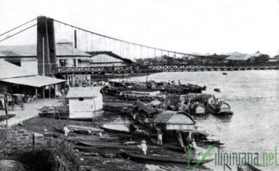 Hanging Bride. The 'Puente Colgante' suspension bridge once hung over the Pasig river and was known to be the first of its kind in East Asia (1852). Photo courtesy of Filipiniana.net.