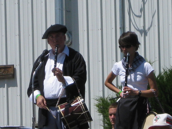 Txistularis Dan Ansotegui and Josie Bilbao play txistu (a Basque flute) at a Gooding Basque Association gathering