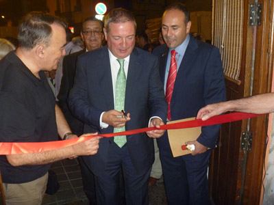 Julian Celaya, center, inaugurates the photo exhibit of traditional Basque tools in Patraix, prior to delivering the festival’s official keynote speech.  