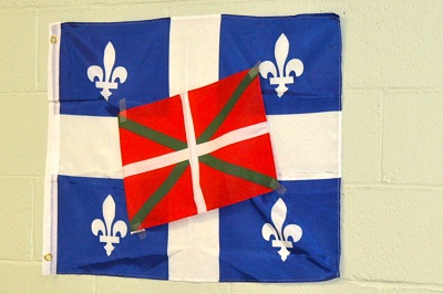 Quebec's flag with the Ikurrina at Euskaldunak of Quebec's Aberri Eguna festivities (photo QuebecEE)