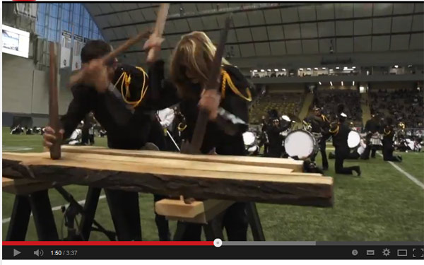 Band members playing the txalaparta in the video