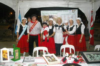 The Basque stand, members of Eusko Txokoa in San Juan, including flag bearers, Yesica Orquera and Diego Landa and the two little ones Ailin Bernal and Joseba Landa