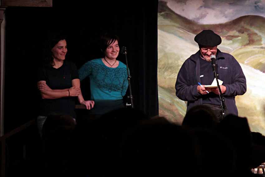 Bertsolaris Maialen Lujanbio and Oihana Iguaran on stage along with Joxe Mallea-Olaetxe (photo Toni R. Milano-Elko Daily Free Press)